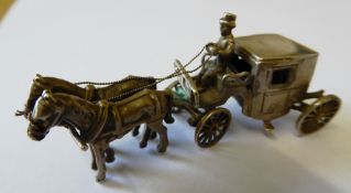 Very small model of a Brougham and driver pulled by a pair of horses, with Dutch silver hallmark CS3