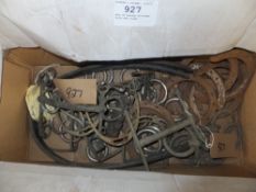 Box of sundry stirrups, bits and rings