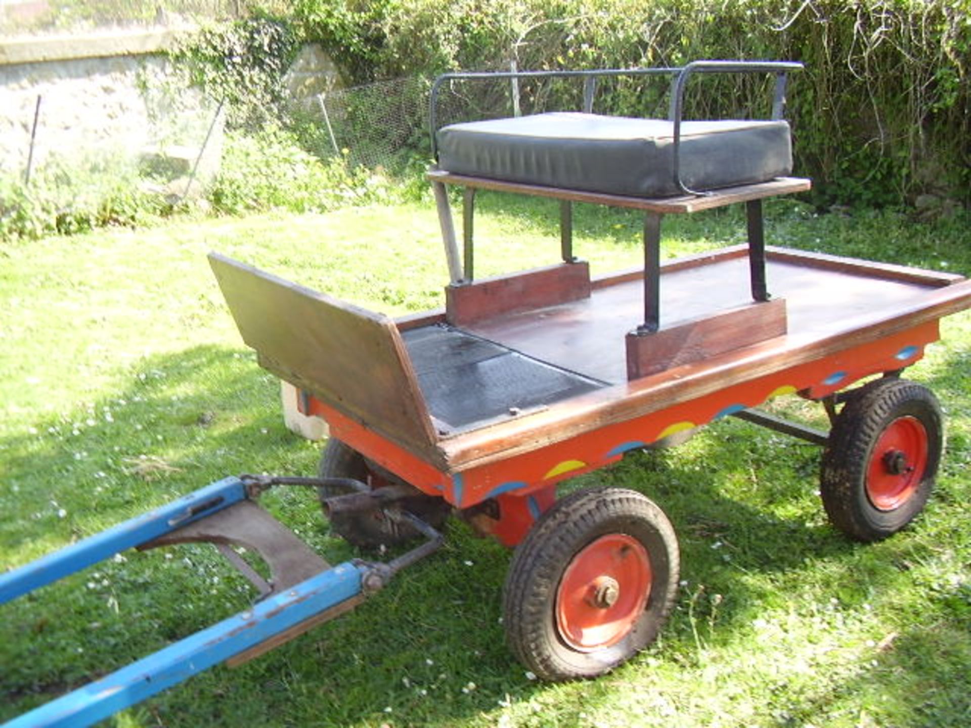 TROLLEY to suit a Shetland pony single or pair. In natural varnished wood with black leatherette cu