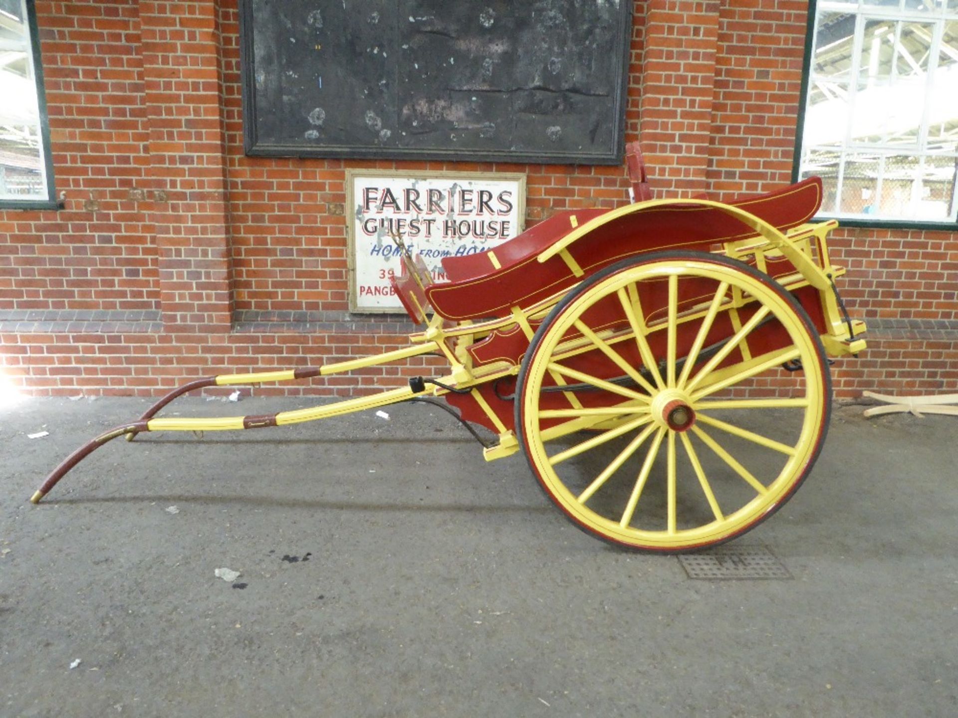 MILK FLOAT to suit 14.2 to 15hh. Painted red and yellow, with matching lines, and black metal work