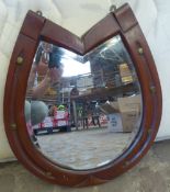 Vintage horseshoe shaped mirror. Measurements 43cms wide x 50cms high