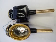 Pair of black/brass oval fronted carriage lamps; in good condition - carries VAT