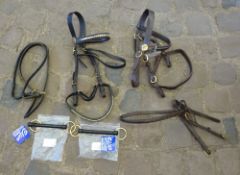 Bag containing in-hand items i.e two pony bridles, and 2 x 5ins in-hand bits