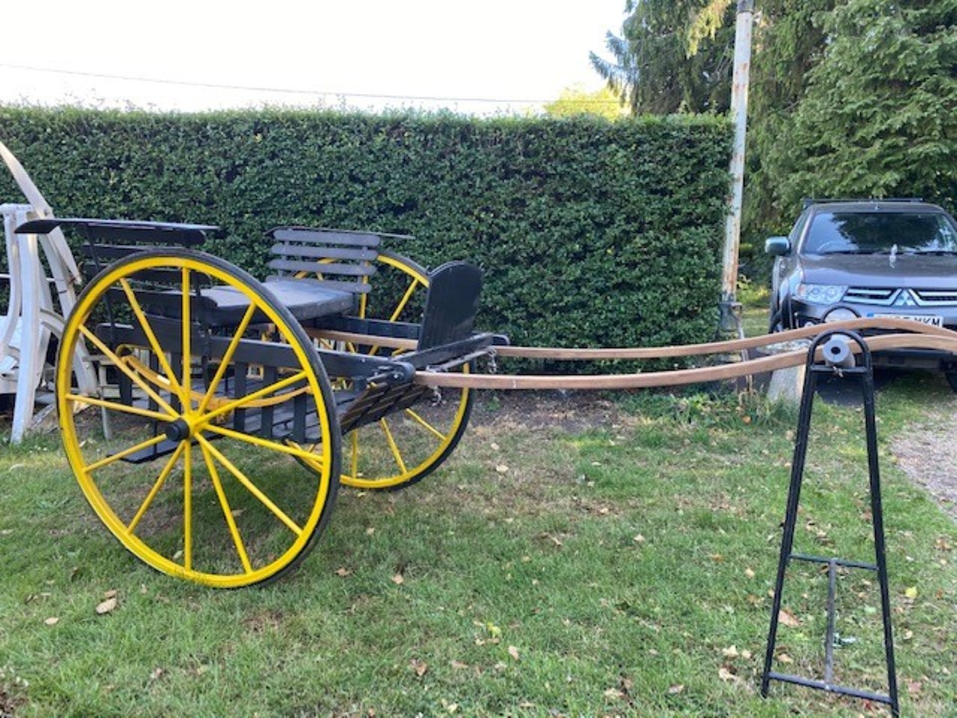 TWO-WHEEL ROAD CART to suit 14.2 to 15hh. Black painted slatted body and sides with black upholster