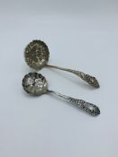 Silver teaspoon, Birmingham 1908, and silver ladle, Birmingham 1898.