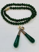 Large pair of jade Pendant earrings together with a necklace of vintage nephrite beads.