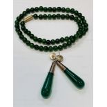 Large pair of jade Pendant earrings together with a necklace of vintage nephrite beads.