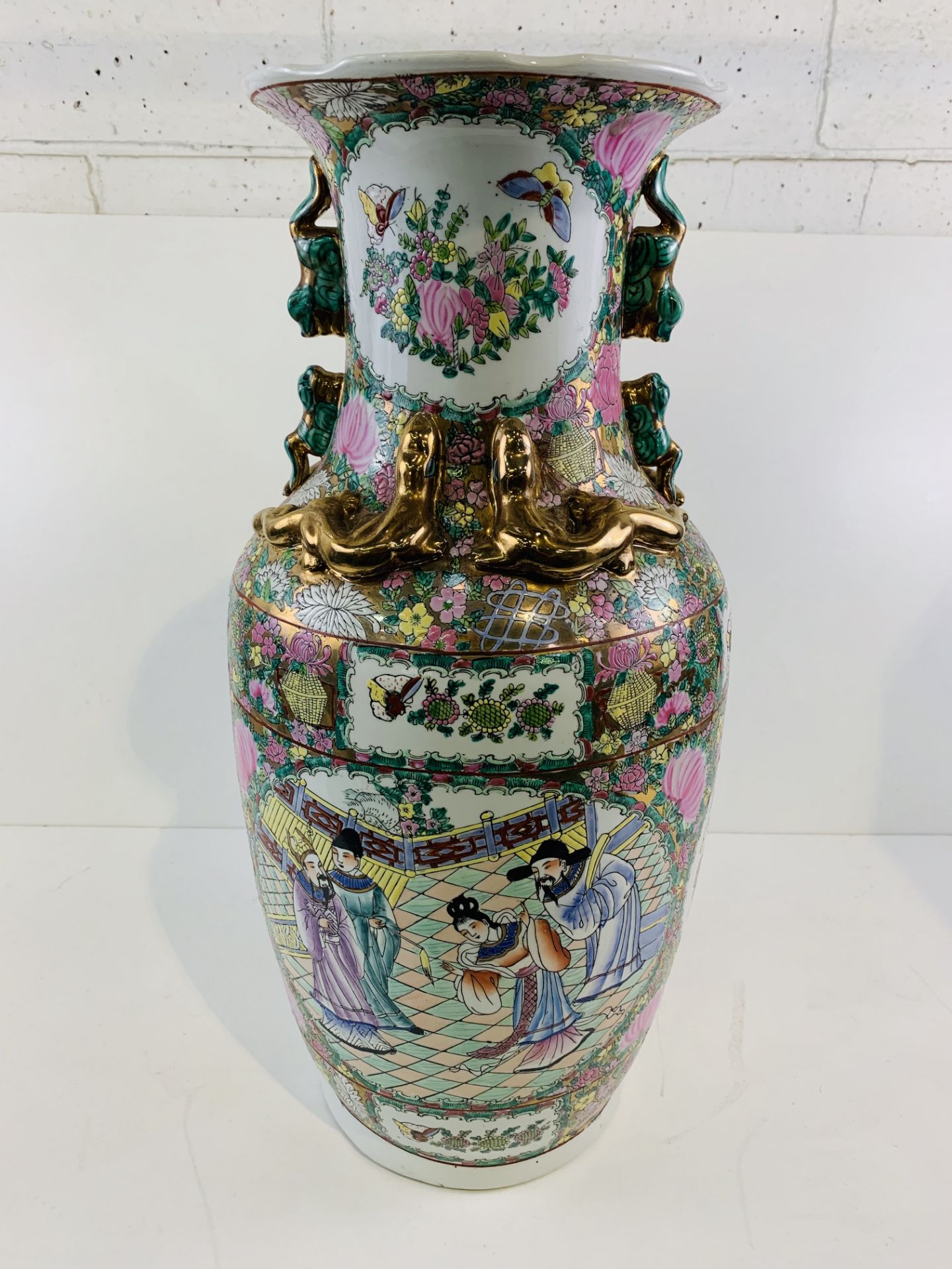 A tall famille rose oriental style vase