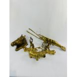 Five brass animal figures.