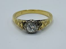 Yellow and white metal (tests as not less than 18ct gold) solitaire diamond ring, approx. .33ct