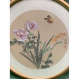 Three circular framed and glazed Chinese paintings on silk of flowers with butterflies and birds.