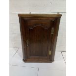 19th Century oak wall hanging corner cupboard.