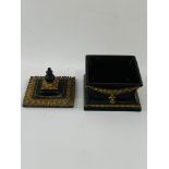 Vintage Baroque style gold and black trinket box with ormolu style rim.