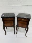 A pair of French style mahogany ormolu decorated marble topped bedside cabinets.