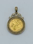 1982 half sovereign set in 9ct gold pendant, 6.3gms