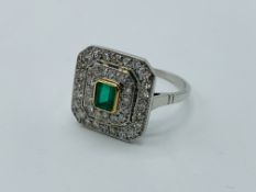 Emerald and diamond square ring.