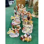 Eleven Continental porcelain figurines, including 2 couples playing board games