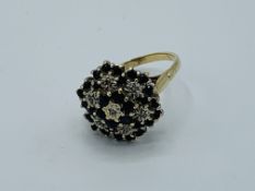 9ct gold, sapphire and diamond chip cluster ring, 4.0gms