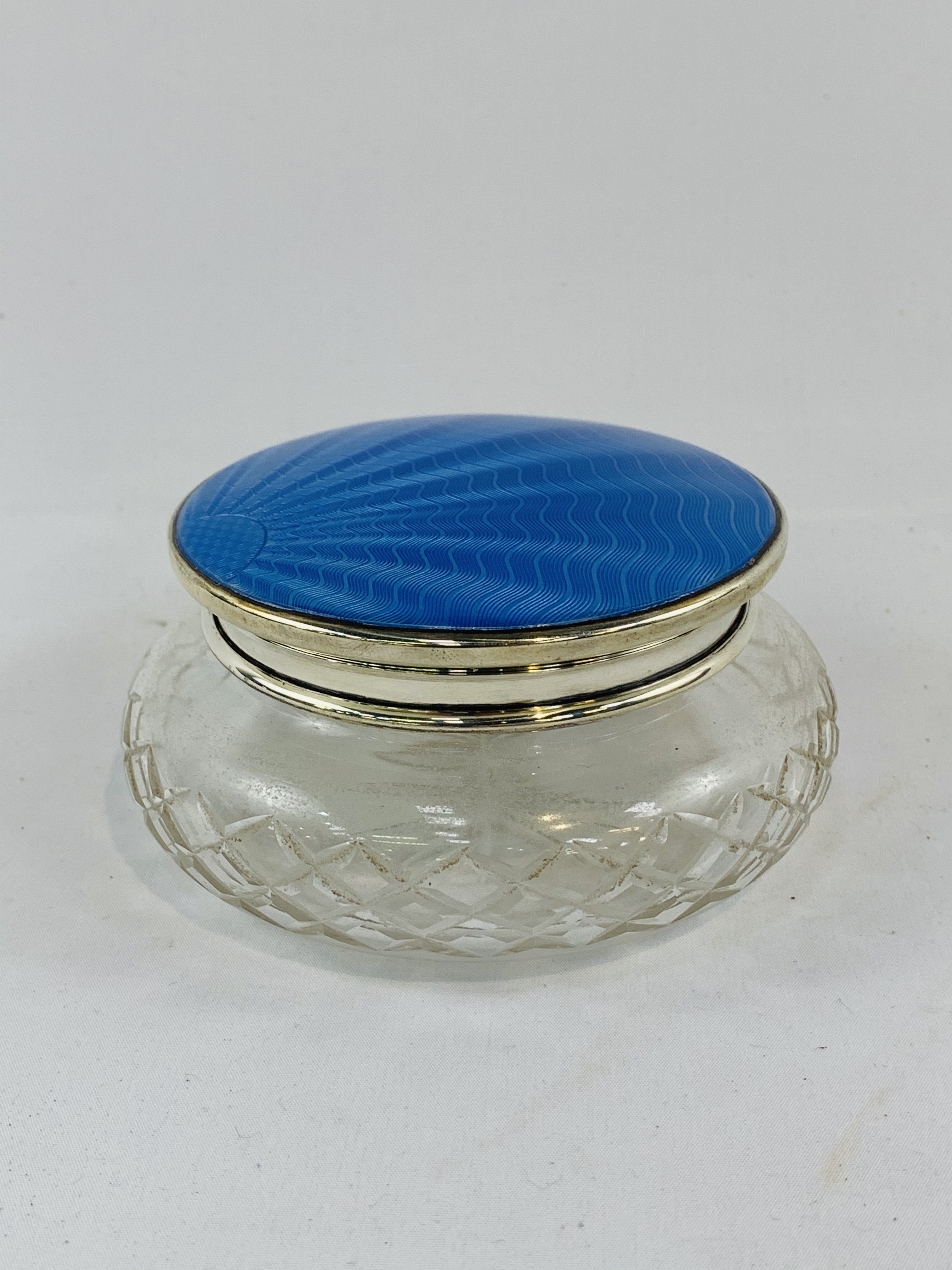 Glass trinket pot with blue enamel glazed silver lid, by W G Sothers Ltd