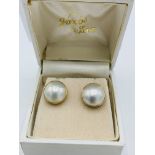 Pair of 9ct gold and pearl stud earrings and another pair of pearl earrings