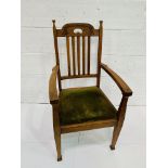 Arts and Crafts oak open armchair.