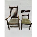 Oak framed open armchair together with a dining chair.