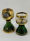 Two gold leaf hand painted musical glass goblets marked Wein and Reuge.