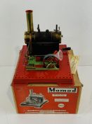 A Mamod twin cylinder super heated model steam engine.