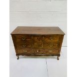 French fruitwood chest of three drawers.