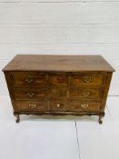 French fruitwood chest of three drawers.