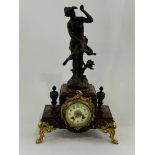 French 19th Century Variegated red marble and bronzed female figural clock.