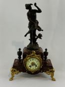French 19th Century Variegated red marble and bronzed female figural clock.