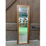 Three framed wall mirrors