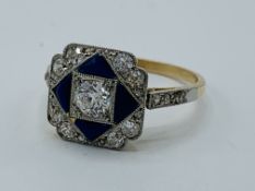 Blue emerald and diamond ring.