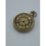 8ct gold cased lady's fob watch.
