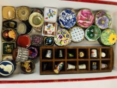 Large collection of assorted pill boxes and display rack of thimbles.