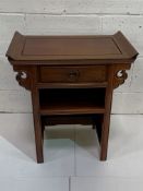 Chinese hardwood display table with frieze drawer and shelf beneath.