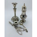 Silver plated sugar caster; candle stick; snuffer and ladle