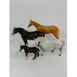 Four Beswick horse figurines