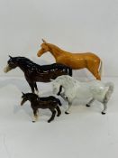 Four Beswick horse figurines