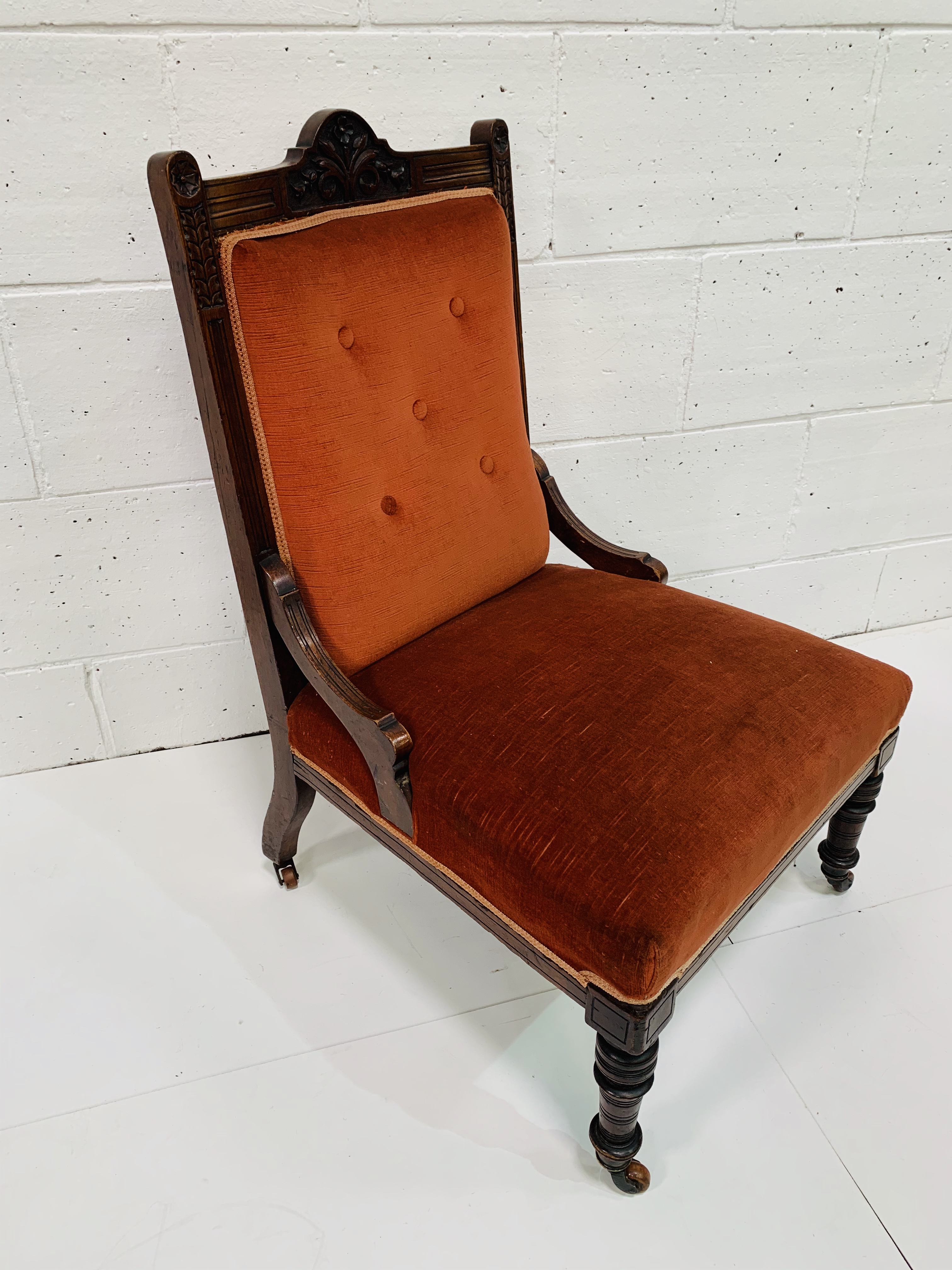 Mahogany framed burnt orange upholstered Edwardian drawing room chair.