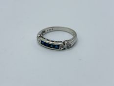 18ct white gold diamond and sapphire half eternity ring.