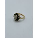 9ct gold, opal and pale green stone ring, 4.5gms