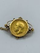 1911 gold half sovereign in 9ct gold brooch, 7.1gms