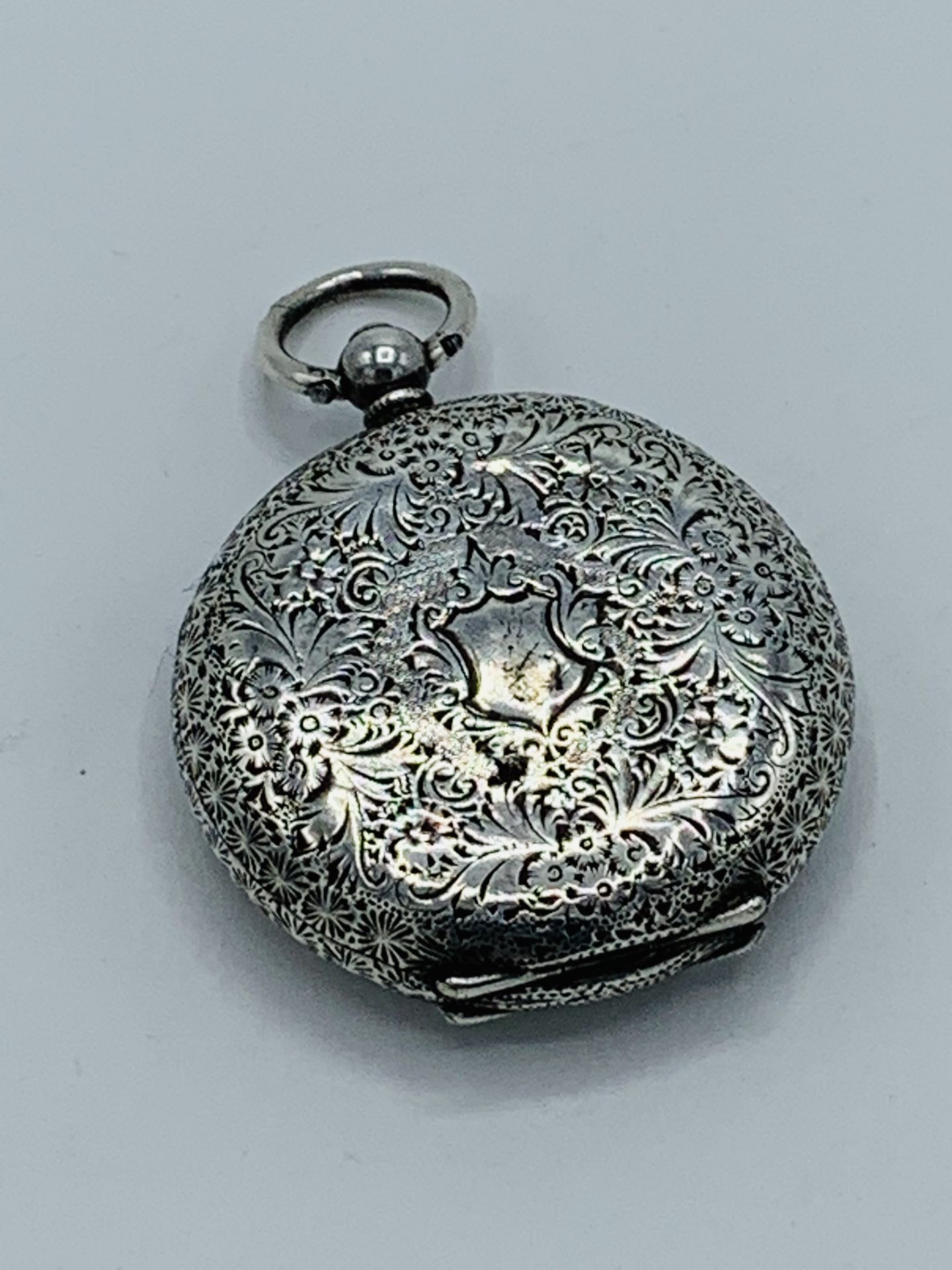 Lady's fob watch hallmarked 935, with white enamel face, and winding key. - Image 3 of 4