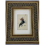 An ornately decorated framed and glazed Indian painting of a Polo Player, and 3 figurines