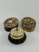 Two soapstone boxes and another box