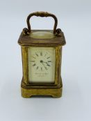 Miniature brass case carriage clock stamped Payne & Son, Lowndes St. Not going.