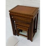 Chinese hardwood nest of four tables.