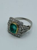 Emerald and diamond ring.
